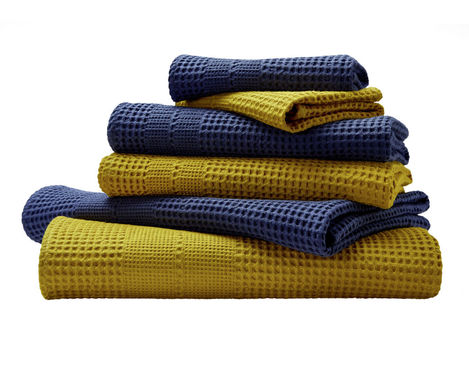 Waffelpikee Handtuch Set aus Bio-Baumwolle von Cotonea in Curry und Azurblau