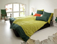 Winter Bio-Bettwäsche im Schlafzimmer aus Edel-Biber in Grün mit Zierknöpfen