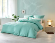 Schlafzimmer mit Bio Jersey-Bettwäsche Merelly in Urban Pool Türkis von Cotonea