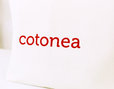 Stofftragetasche aus Bio-Baumwolle in Natur mit Cotonea Logo Detailansicht