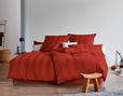 Satin Bettwäsche von Cotonea mit Webstreifen im Schlafzimmer in Orange