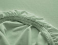 Spannbettlaken aus Bio Jersey überzogen auf Matratze in Kiwi Grün
